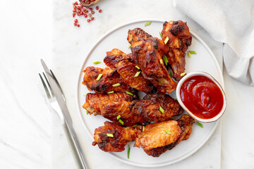 Spicy chicken  wings in bbq sauce , spicy chicken wings cooked in the air fryer