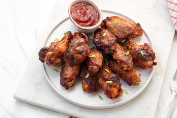Spicy chicken  wings in bbq sauce , spicy chicken wings cooked in the air fryer
