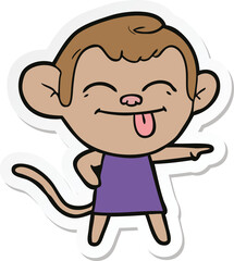 sticker of a funny cartoon monkey pointing