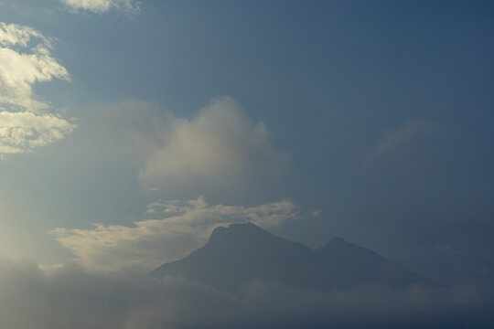 cerro de la silla in monterrey, mexico on a sunney day that turn on cloudy