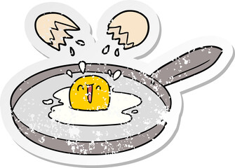 distressed sticker of a cartoon egg frying