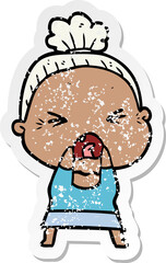 distressed sticker of a cartoon angry old woman