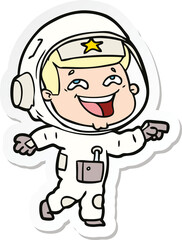 Obraz premium sticker of a cartoon laughing astronaut