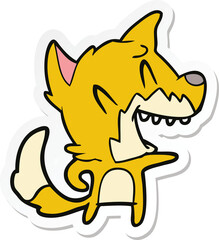 sticker of a laughing fox cartoon
