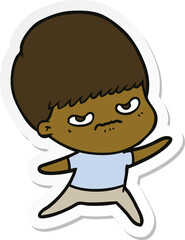 sticker of a cartoon angry boy