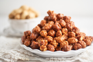 Bowl of sugar coated peanuts or garapiñados