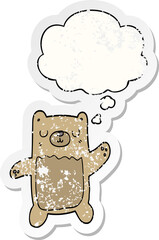cartoon bear and thought bubble as a distressed worn sticker