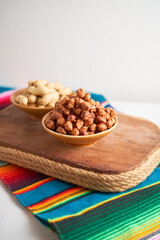 Bowl of sugar coated peanuts or garapiñados