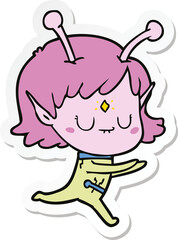 sticker of a cartoon alien girl