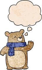 cartoon bear wearing scarf and thought bubble in grunge texture pattern style