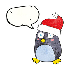 speech bubble textured cartoon penguin in christmas hat