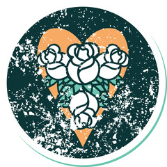 distressed sticker tattoo style icon of a heart and flowers
