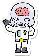 sticker of a cartoon big brain alien crying