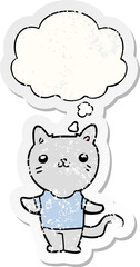 cartoon cat and thought bubble as a distressed worn sticker