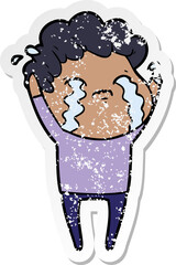 distressed sticker of a cartoon man crying