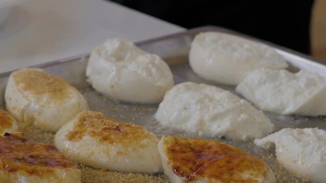  A Traditional Indonesian Street Food close-up. Uli Bakar sticky rice food.