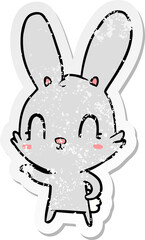 distressed sticker of a cute cartoon rabbit