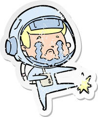 distressed sticker of a cartoon crying astronaut