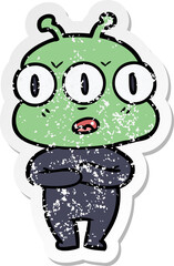 distressed sticker of a cartoon three eyed alien