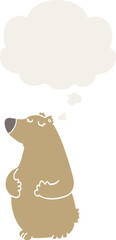cartoon bear and thought bubble in retro style