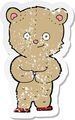 retro distressed sticker of a cartoon teddy bear