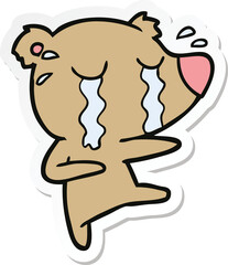 sticker of a cartoon crying bear