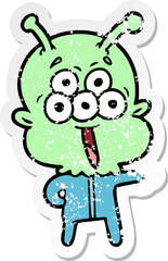 distressed sticker of a happy cartoon alien