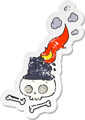 retro distressed sticker of a cartoon burning candle on skull
