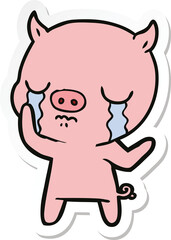 sticker of a cartoon pig crying
