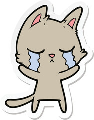 sticker of a crying cartoon cat