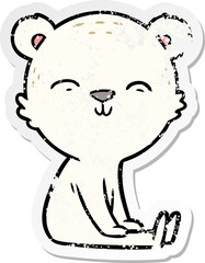distressed sticker of a happy cartoon polar bear sitting