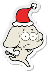 sticker cartoon of a unsure elephant running away wearing santa hat