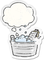 cartoon old washboard and bucket and thought bubble as a distressed worn sticker
