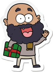 sticker of a cartoon crazy happy man with beard and gift under arm