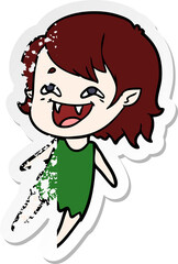 distressed sticker of a cartoon laughing vampire girl