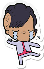 sticker of a cartoon crying girl wearing space clothes