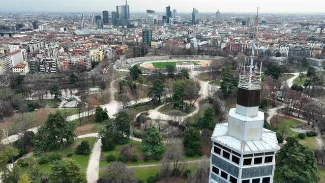 flying over an ancient observation deck in the center of Milan in 4k