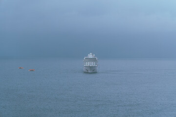 Cruise Ship in the Open Ocean Entering Port