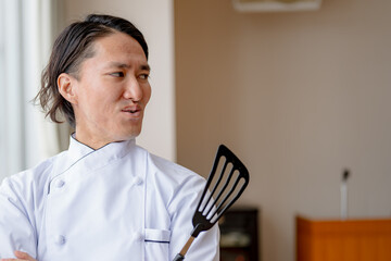 爽やかな笑顔のシェフ