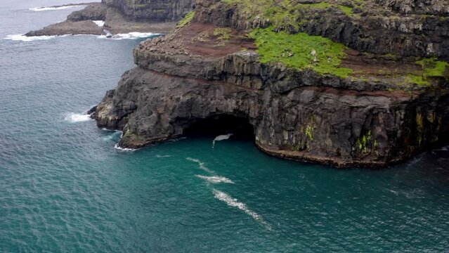 aerial view of faroe islands and sea during a cloudy day