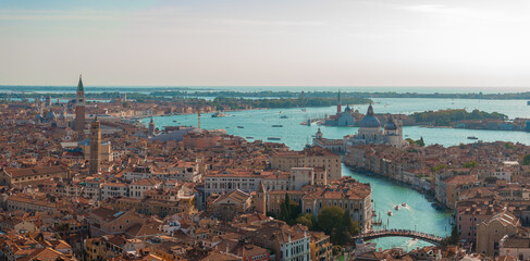 Obraz premium Aerial View of Venice near Saint Mark's Square, Rialto bridge and narrow canals. Beautiful Venice from above.