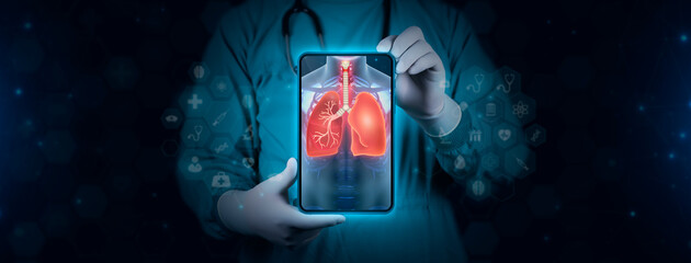 Lung problems, tuberculosis, lung cancer. The doctor analyzes a chest x-ray. You can see the lungs on the tablet. Digital technology background.