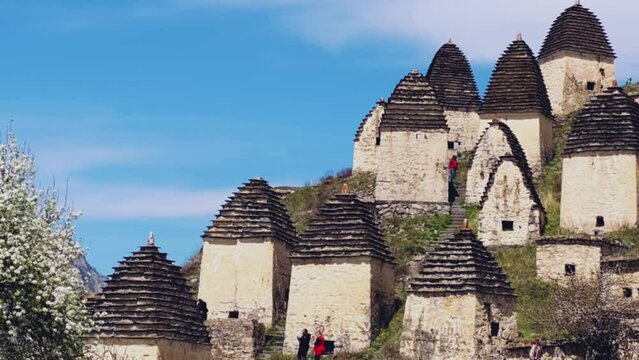 Dargavs is a unique city of the dead in North Ossetia. There are many houses and a crypt-tomb on the top of the rocky mountains. The City of the Dead on the mountainside near the Midagrabindon River. 