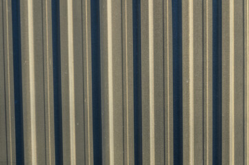 Fototapeta premium profile metal sheet as a background in the sun 1