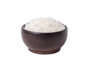 Rice in wooden cup isolated on white