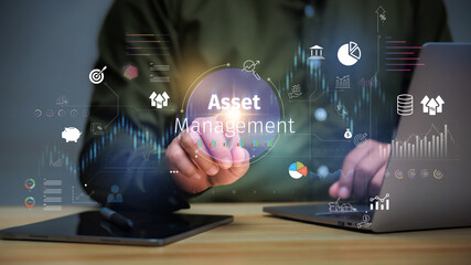 Asset management concept, Businessman Holding asset management and Icon  on virtual display....