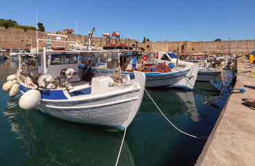 Fototapeta na wymiar Fishing boats in Mandrak harbor on Rhodes island.