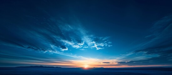 Light lingering in deep blue sky of sunset scene