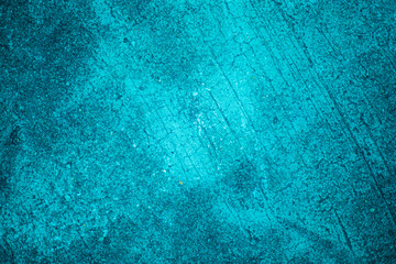 Grunge blue wall texture background. Close up image of concrete surface.