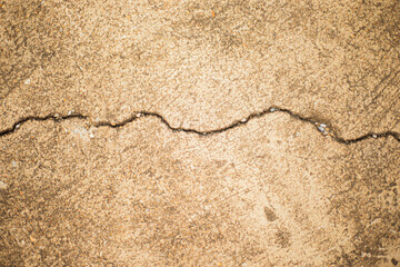 Fototapeta na wymiar Cracks on the concrete floor. Abstract background and texture for design.